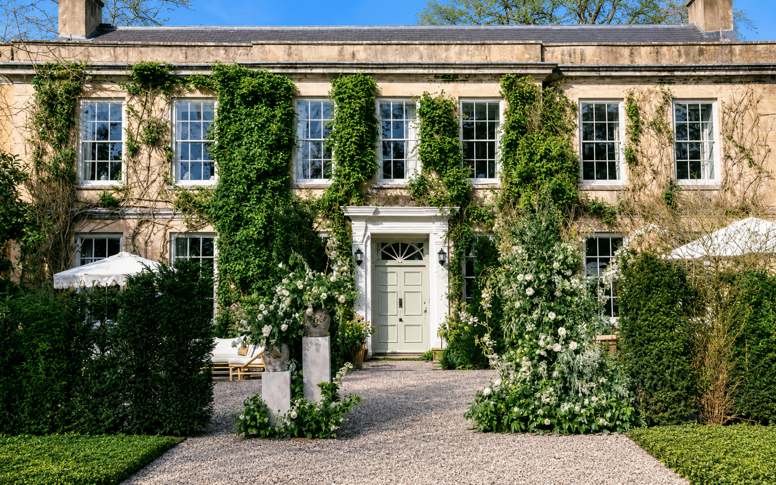 The Lost Music Hall — ivy-clad front with garden ceremony